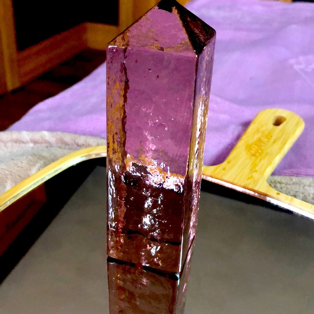 Amethyst, colored glass paperweight tower